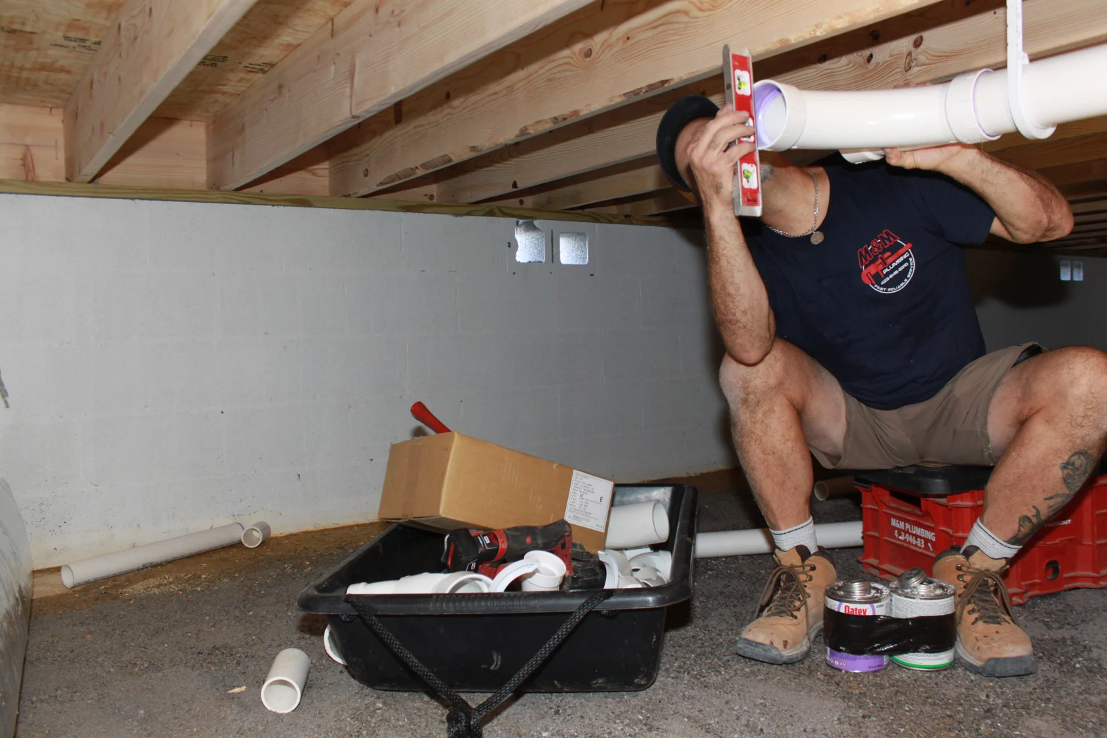 Mike installing residential drain piping